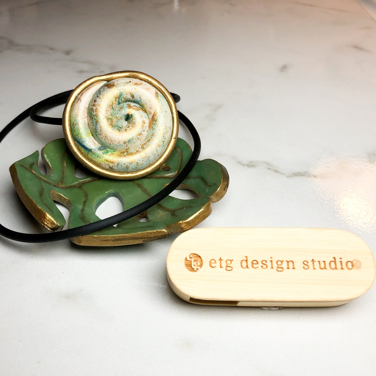 Faux Bezel Stone Snail Pendant: Soft Swirl